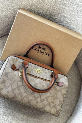 شنطة coach مع إيد طويلة