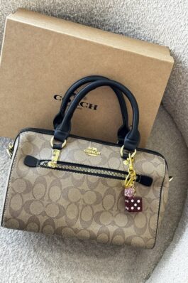 شنطة coach مع إيد طويلة